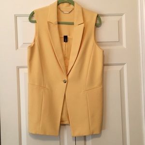 Long yellow vest from White House Black Market. Size 12. Like new condition.